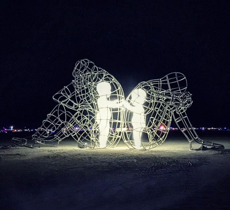 Burning Man Sculpture "Love" - Inner Child Trapped in Us, by Alexandr Milov (Night, Glowing)