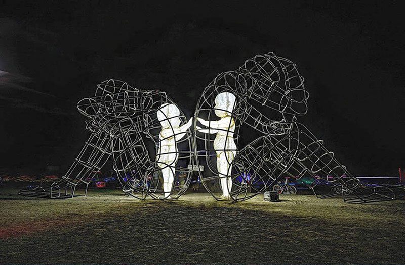 Burning Man Sculpture "Love" - Inner Child Trapped in Us, by Alexandr Milov (Night)